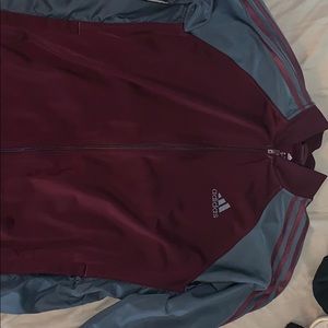 A maroon and grey jacket